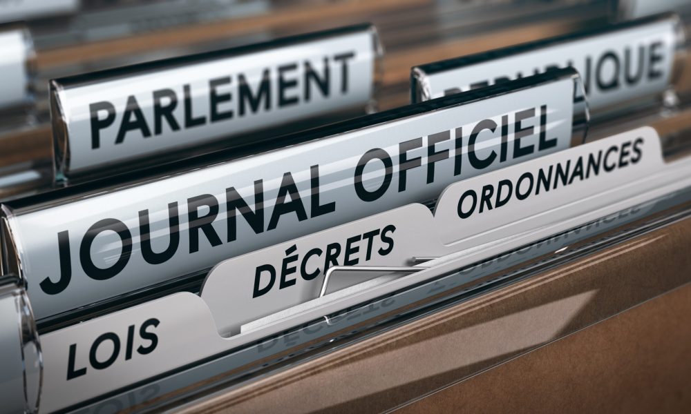 Vote des lois au parlement et publication au journal officiel