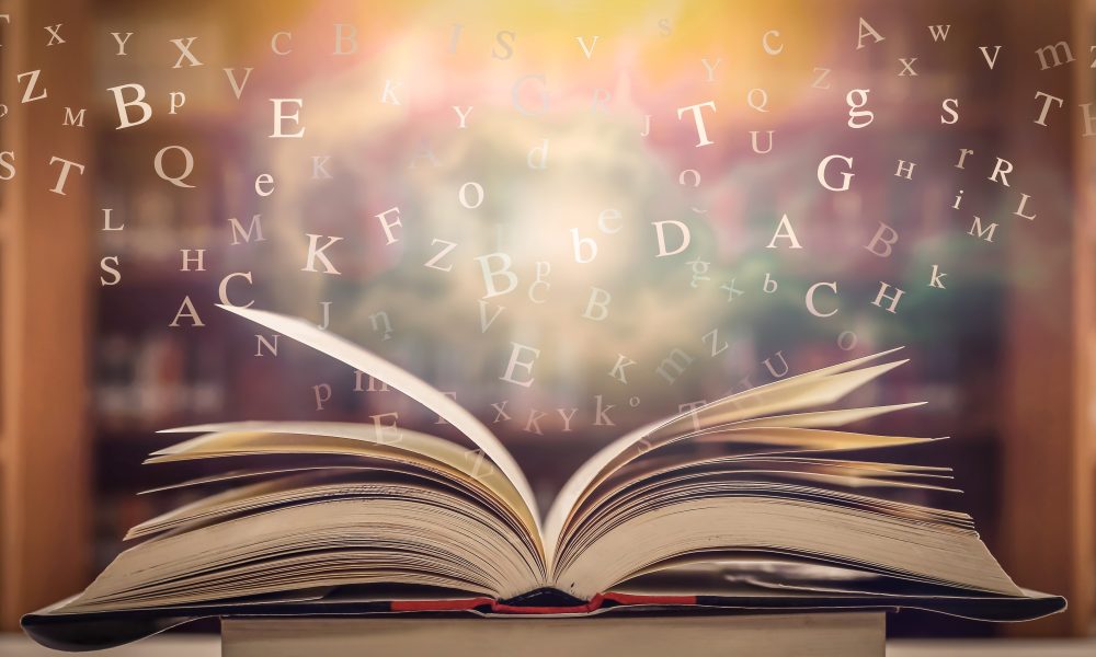 The concept of education by planting a tree of knowledge in the opening of an old book in the library and the magical magic of light that flies to the destination of success. Beautiful background