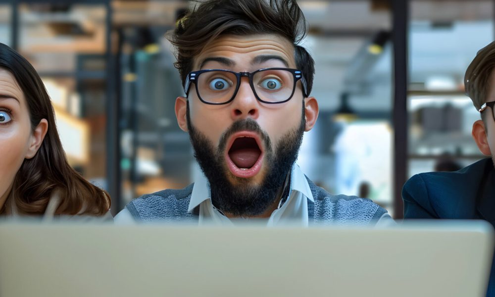Stressful Workplace Crisis: Employees Reacting to Social Media Backlash   High Resolution Image Capturing Urgency and Stress in Reputation Management